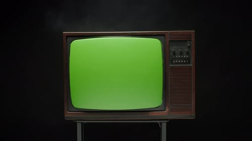 Old Retro Television with Antenna on Grey Background