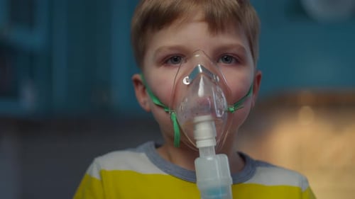 Child Wearing Nebulizer Mask for Respiratory Treatment