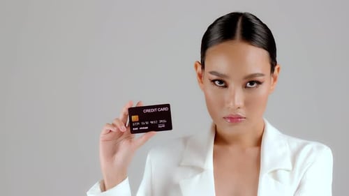 Elegant Woman Holding Credit Card