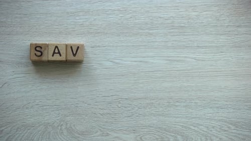 Wooden Blocks Spelling Out Save Planet on Table