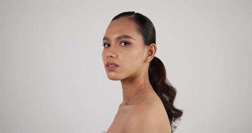 Young Woman Posing in Studio Setting