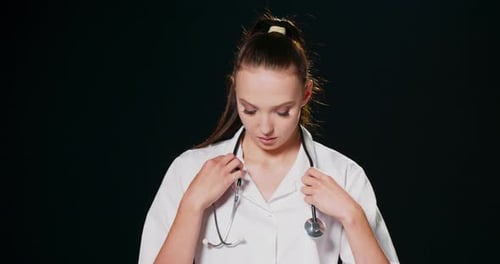 Young Woman Doctor With Stethoscope and Lab Coat