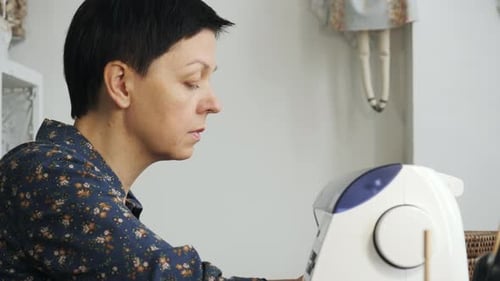 A seamstress working