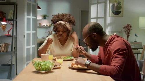Couple Eating Pasta at Table Together Indoors
