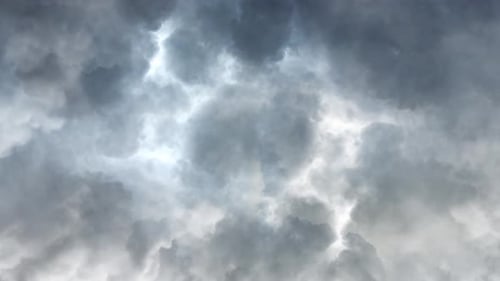 4k white cumulonimbus clouds in the dark sky that turned into a thunderstorm