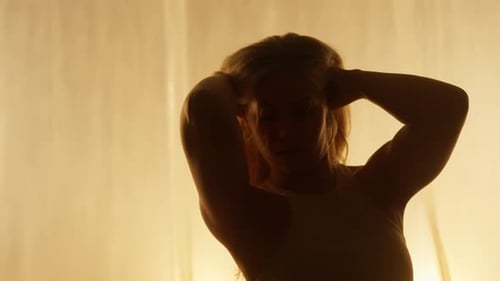 Portrait of a Professional Dancer Performing in Studio in Soft Warm Lighting