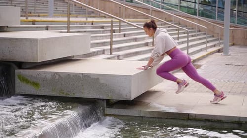 Urban Woman Doing Mountain Climber Exercise