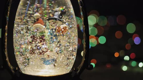 Magical Snow Globe Scene With Festive Lights