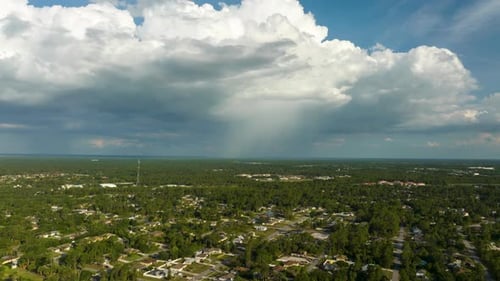 Landscape of Dark Ominous Clouds Forming on Stormy Sky Before Heavy Thunderstorm Over Rural Town