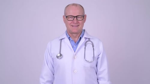 Smiling Doctor in White Coat with Stethoscope