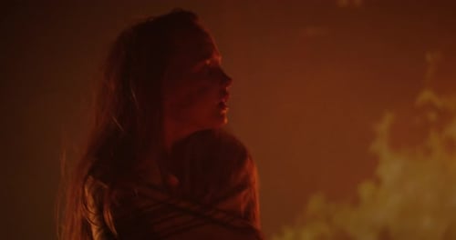 Person with Mouth Open in Front of Fire