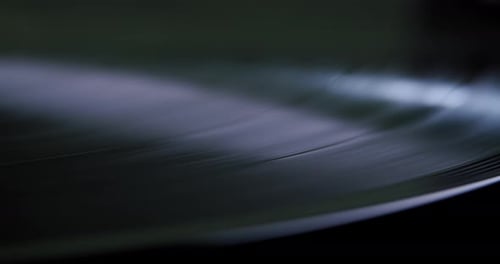 Close Up View of Vinyl Record Player Turntable with Its Stylus Running Along Music Plate