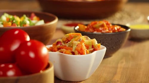 Variety of Fresh Dishes on Wooden Table