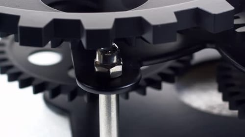 Interlocking Gears Rotating in a Smooth Motion