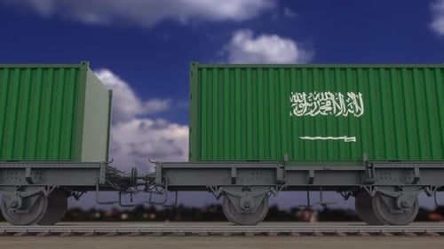 Train et conteneurs avec le drapeau de l'Arabie Saoudite