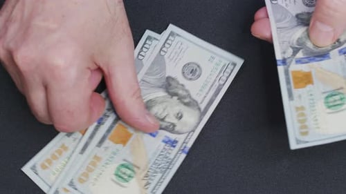 Hands Count United States One Hundred Dollar Bills