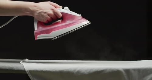 Ironing a white shirt