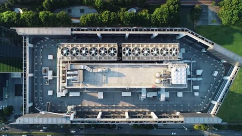 Aerial Top Down View of Ventilation and Air Conditioning Systems Installed on the Rooftop of a