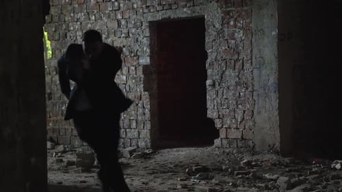 Man in Suit Escapes From Sniper with Fire in the Old Building