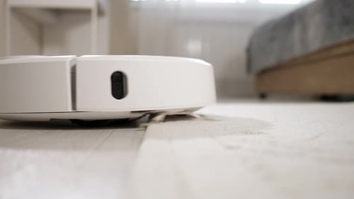 Robotic Vacuum Cleaner Cleans Home Interior