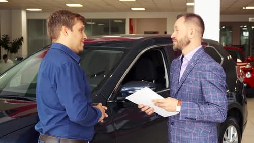 Men Closing Deal in Showroom