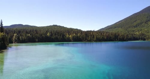 Aerial view of beautiful lake and mountains 4k