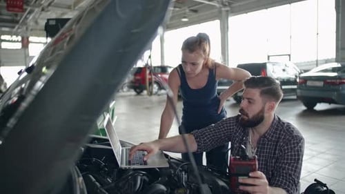 Checking Car with Laptop