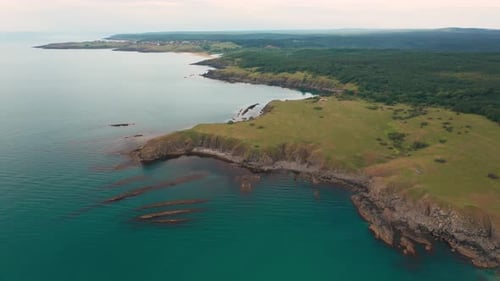 Drone flight around a picturesque rocky coastline