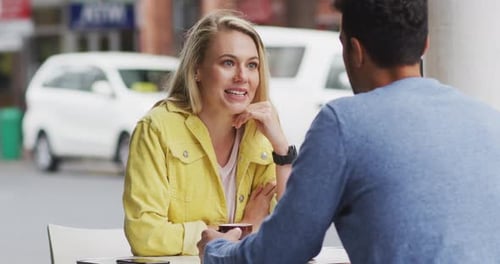 Caucasian couple enjoying at terrace coffee