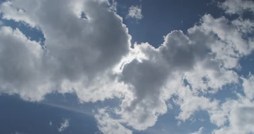 Beautiful Sky with Sun and White Clouds
