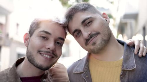 Lgbt Gay Male Couple Having Tender Moment Hugging Outdoor in the City