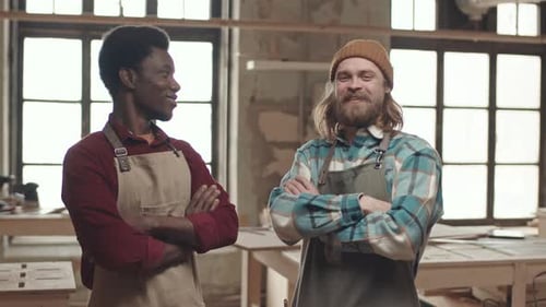 Portrait of Two Diverse Craftsmen in Workshop