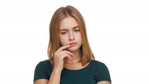 Portrait of Adult Woman with Brown Hair Being Deep in Thoughts Doing Pensive Gesture Trying to