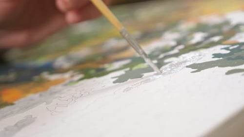 Close Up Painting on Numbered Canvas with Brush