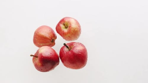 Fresh Red Apples on a White Background