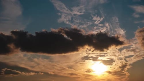 Dramatic Clouds During Golden Sunset Time-Lapse