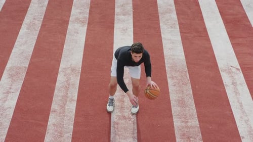Dribbler un ballon de basket