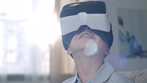 Boy Wearing VR Headset in Bright Home