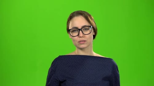 Business Lady Smiling and Showing Thumbs Up. Green Screen