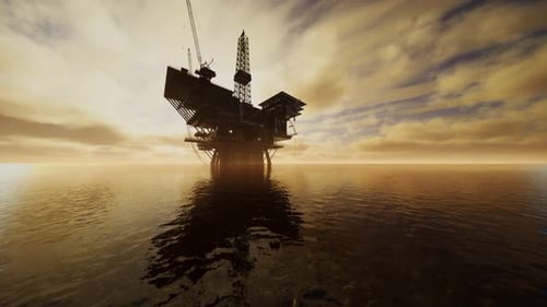 Offshore Jack Up Rig mitten im Meer bei Sonnenuntergang