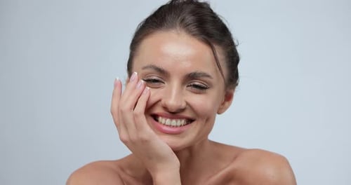 Smiling Young Adult Woman with Natural Make Up