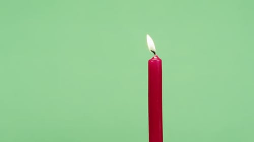 Red candle burning