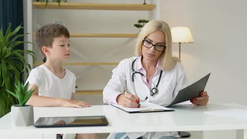 Child with Doctor During Medical Checkup