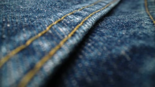 Denim Fabric Close Up Texture with Stitching