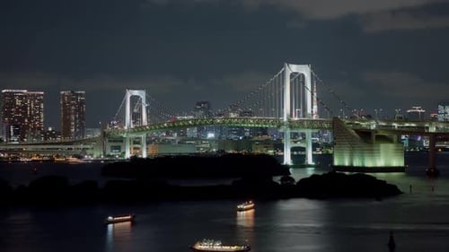Time Lapse looking across Tokyo Bay at the Rainbow Bridge and Tokyo