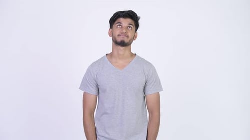 Young Adult Posing with Frustration on White
