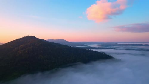 Mountains and Fog at Beautiful Sunrise