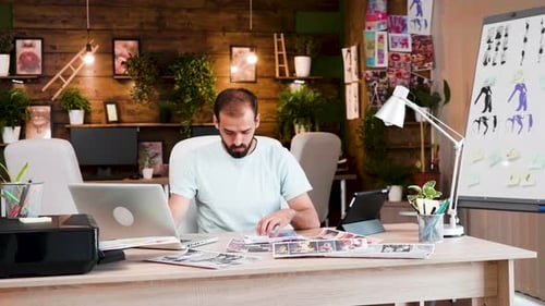 Handsome Beard Young Creativ Director Working on His Project in the Office