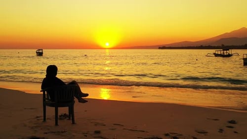 Beautiful happy lady on vacation enjoying life at the beach on summer white sandy and blue backgroun