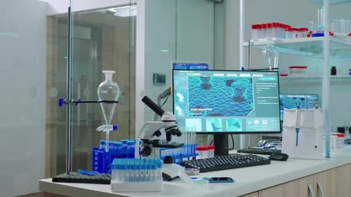 Laboratory with Microscopes and Lab Equipment on Counters